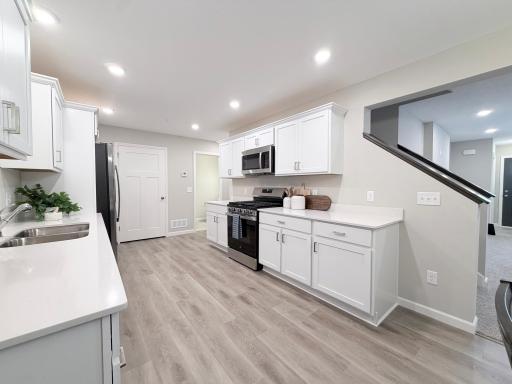 Ample counter and cabinet space in the kitchen.
