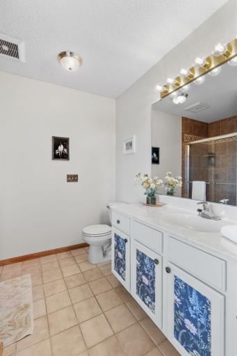 Enjoy the convenience of your own private bathroom, complete with a spacious vanity and separate tiled shower.