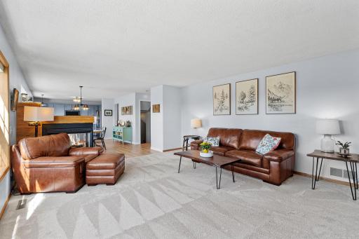 Picture yourself relaxing on the couch with your favorite show while enjoying natural light and beautiful backyard views.