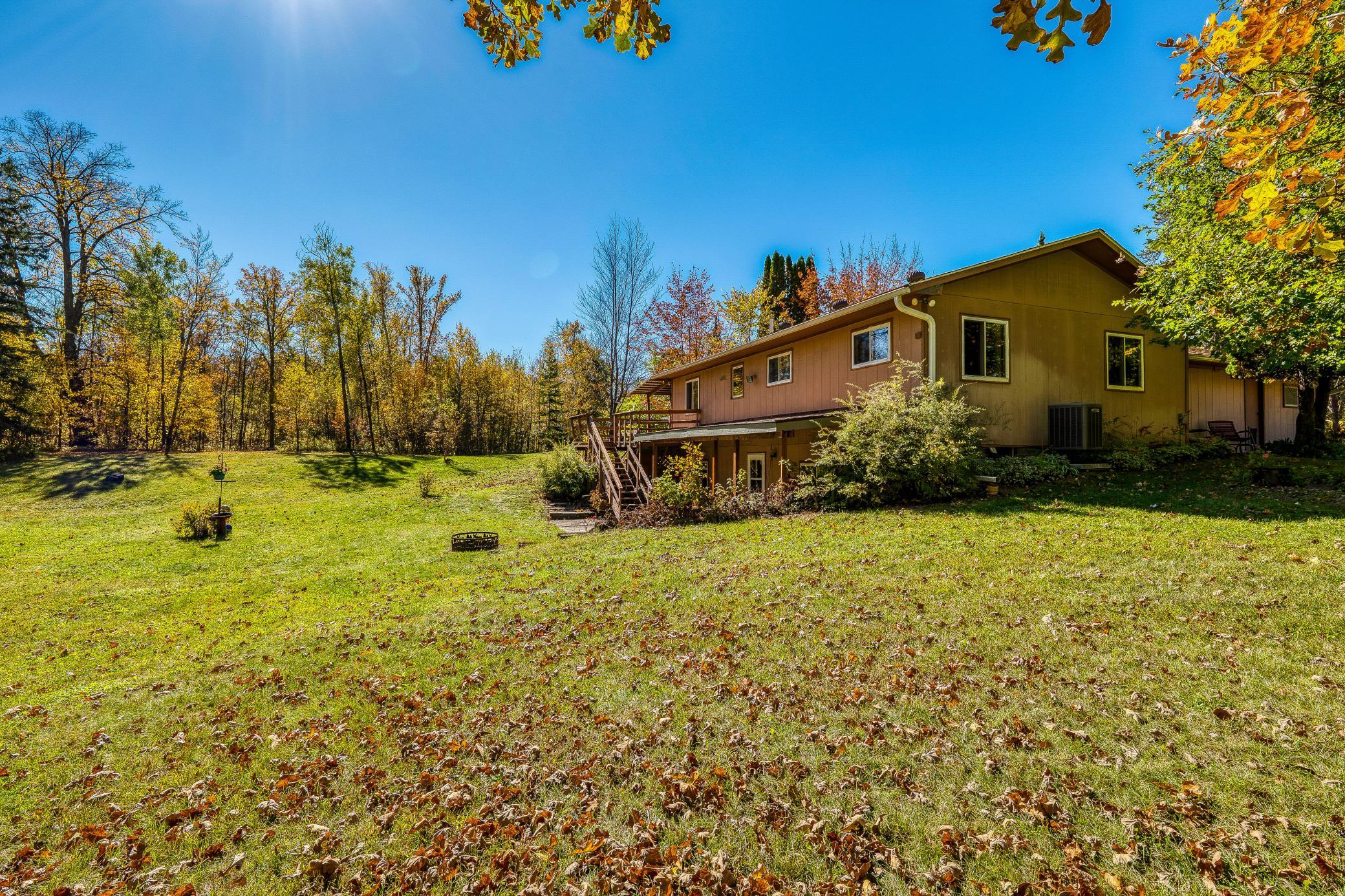 Side view with walkout basement and patio