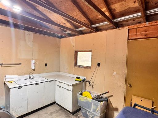 Produce cleaning/or fish cleaning area in the attached garage.jpeg