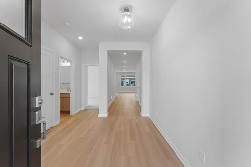 Open foyer has plenty of room to welcome guests. Similar home shown. Color and options can vary.