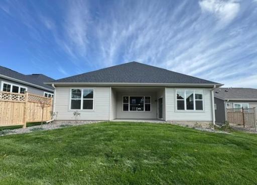 Home comes completely landscaped with patio, shrubs, sod, Cedar privacy fence and irrigation. Enjoy relaxing on your covered patio! Similar home shown. Color and options can vary.