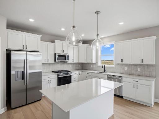 (All the following photos are of a similar home, actual finishes may vary.)