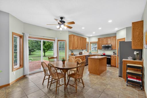 Huge kitchen w/center island, dining space, and patio doors to deck!