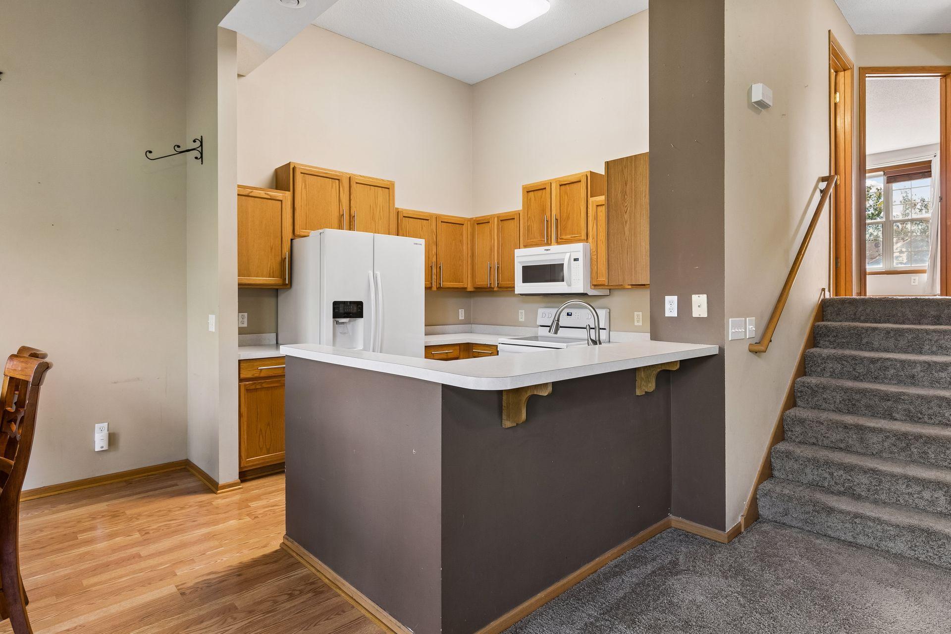 Tall ceilings in the Kitchen allow for a bright space to cook and entertain