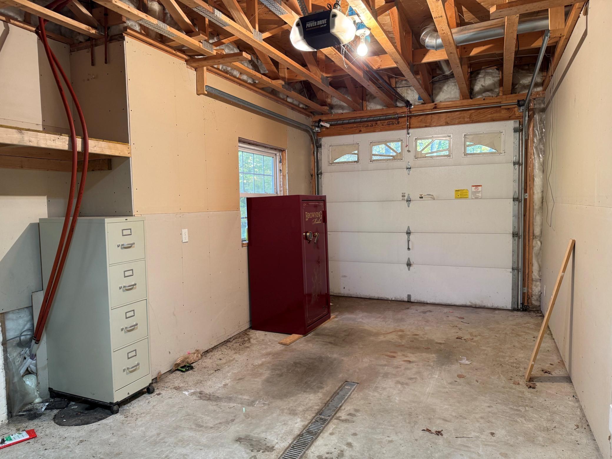 4th garage stall for toys and lawnmowers.