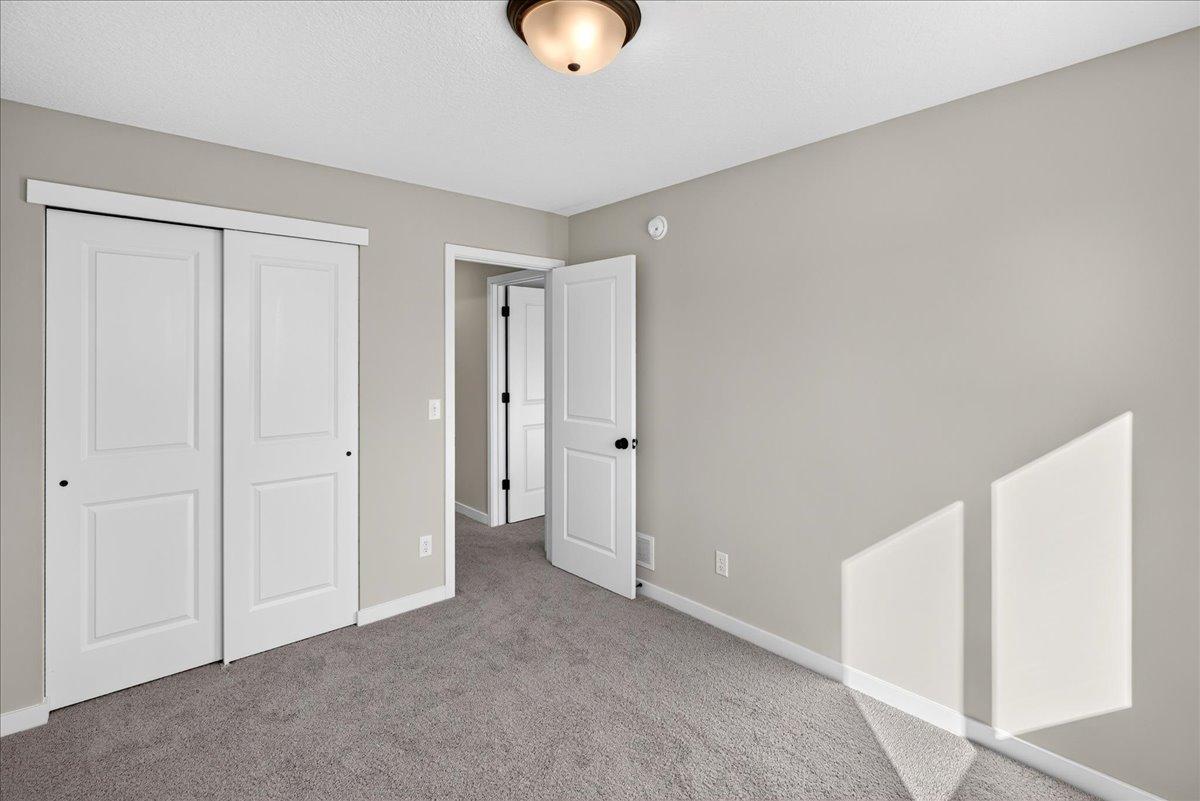 7077 Kittredge Lane NE- Upper Bedroom 2.
