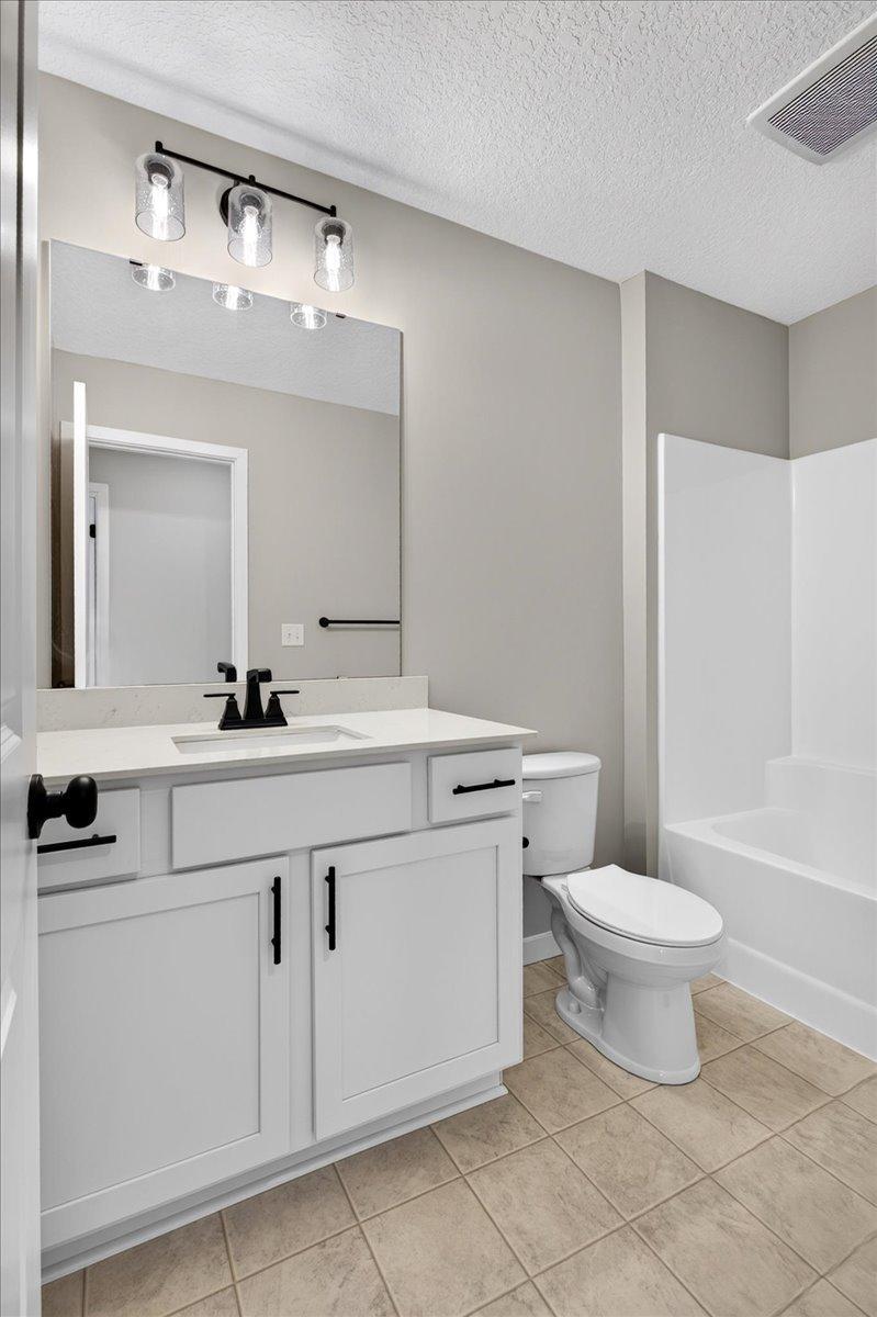 7077 Kittredge Lane NE- Upper Main Full Bathroom.