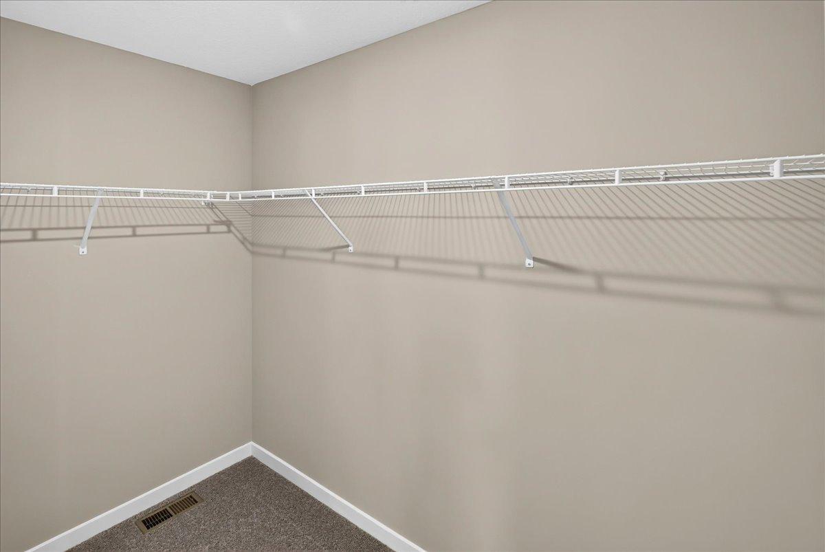7077 Kittredge Lane NE- Primary Suite Walk-in Closet