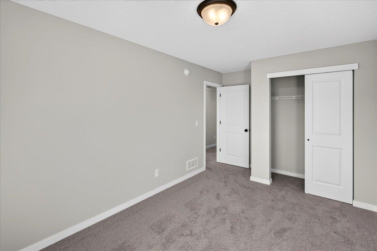 7077 Kittredge Lane NE- Upper Bedroom 3.