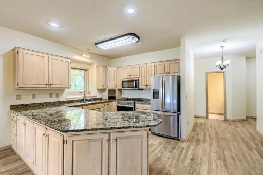 9445 Winslow Chase N Kitchen with SS appliances and gorgeous granite counters