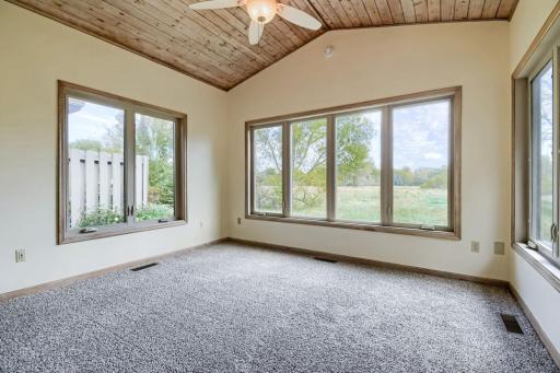 Enjoy the view and privacy frm the sunroom. Walks out to paver patio