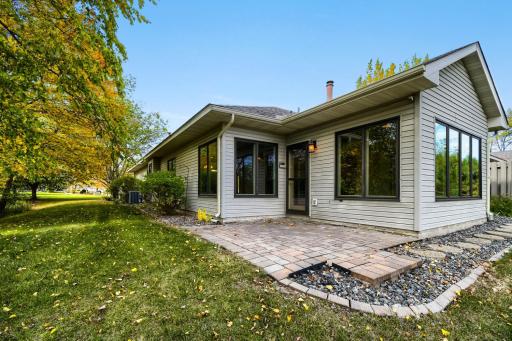 Private paver patio overlooking the wetland area