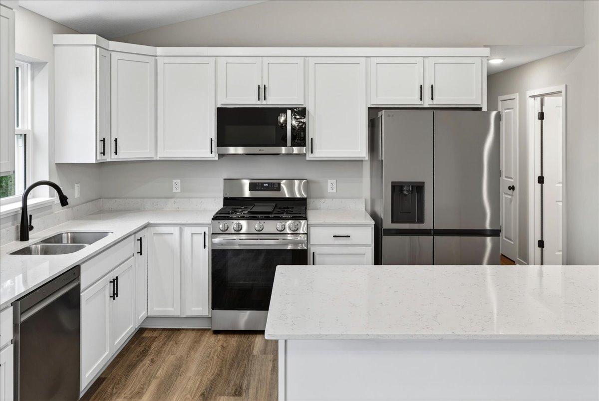 Photo taken of another home with similar plan and finishes.