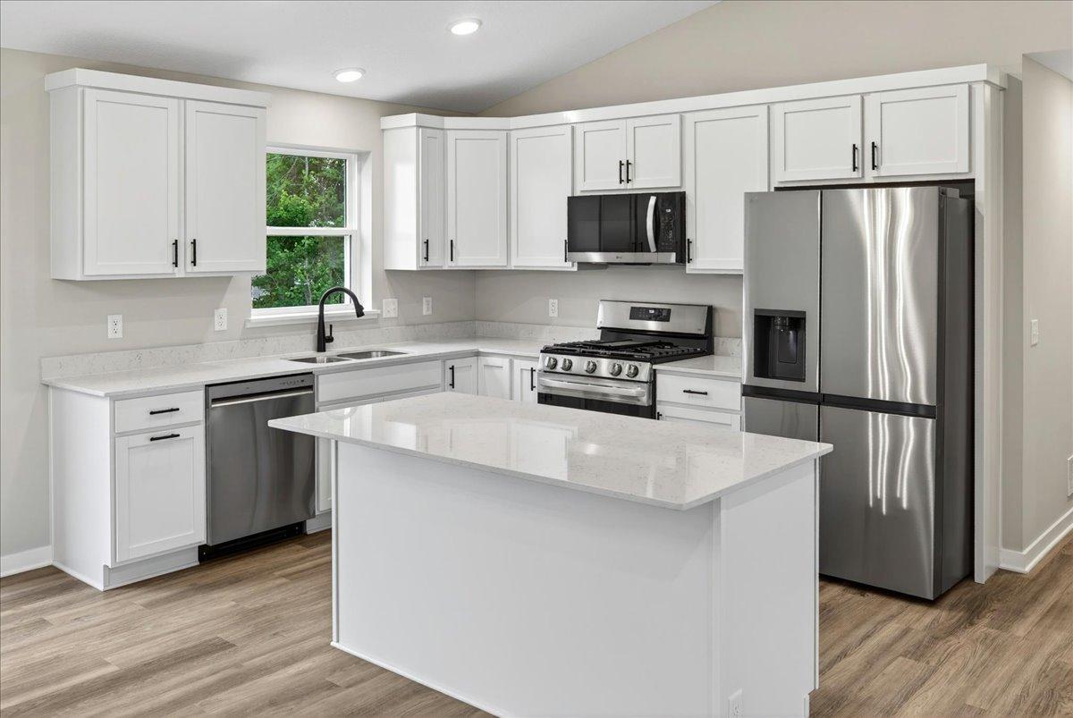 Photo taken of another home with similar plan and finishes.