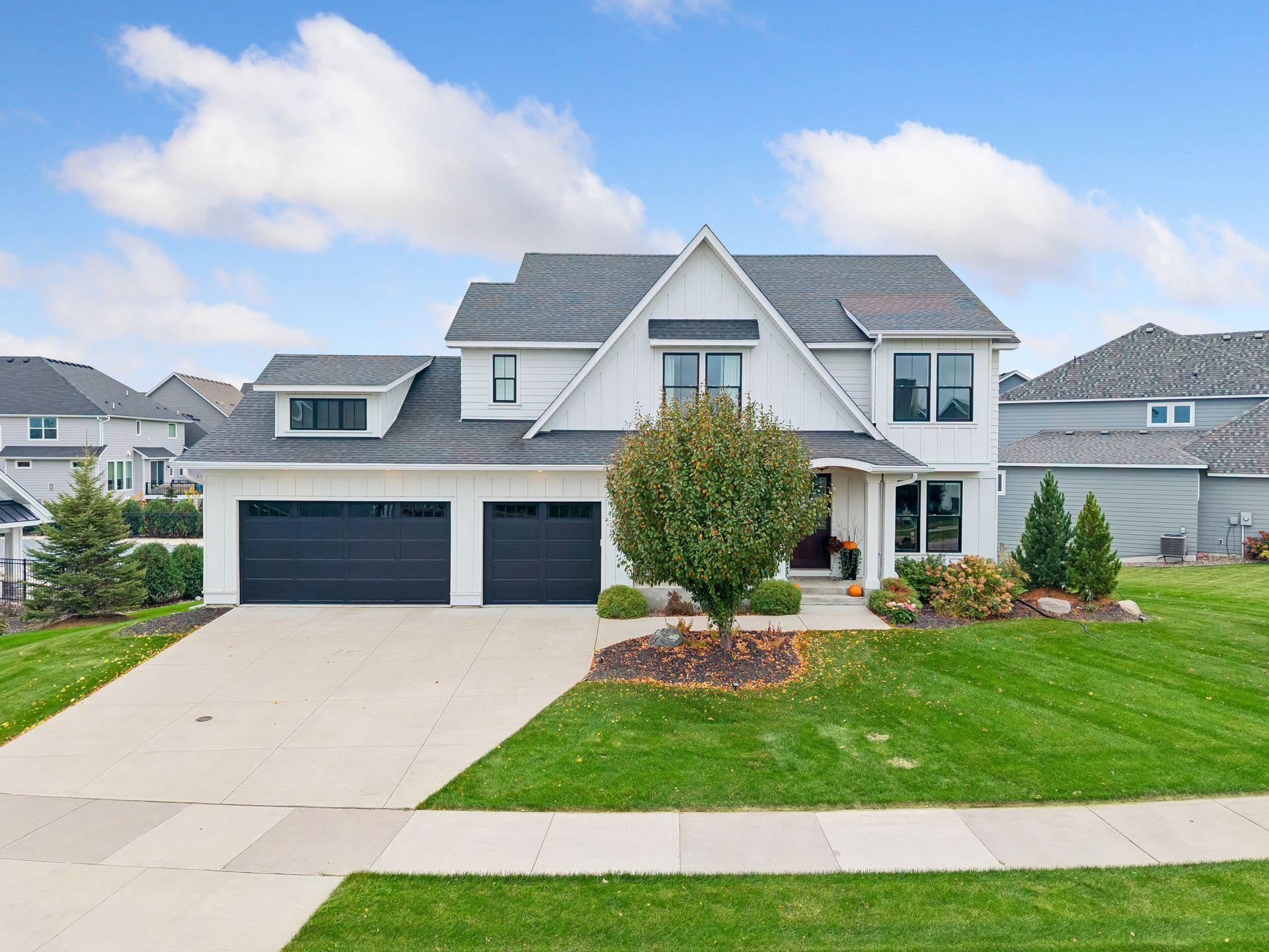 Enjoy a fully insulated three-car garage with 220V electrical service for EV charging!