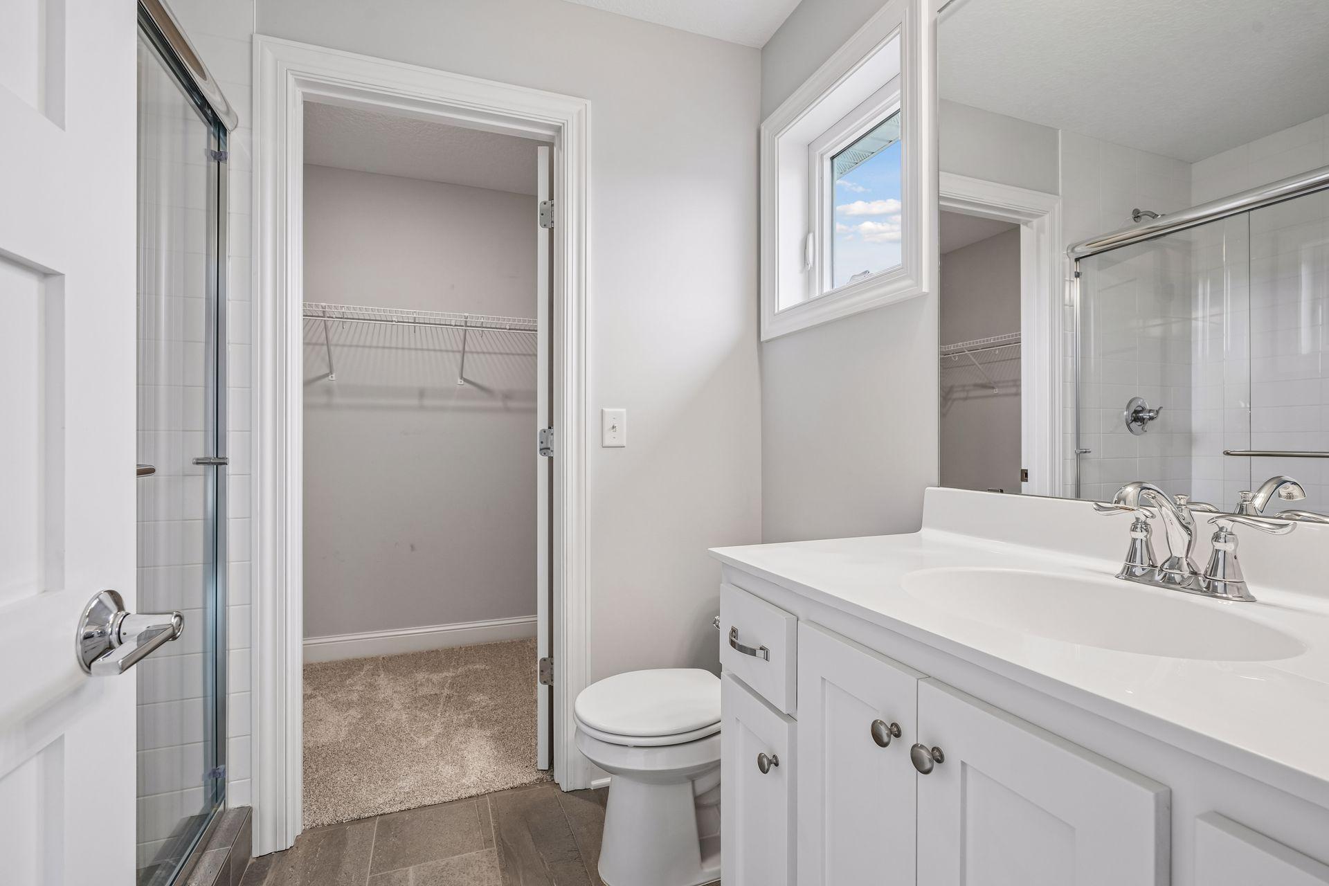 Private junior suite bathroom and walk-in closet!