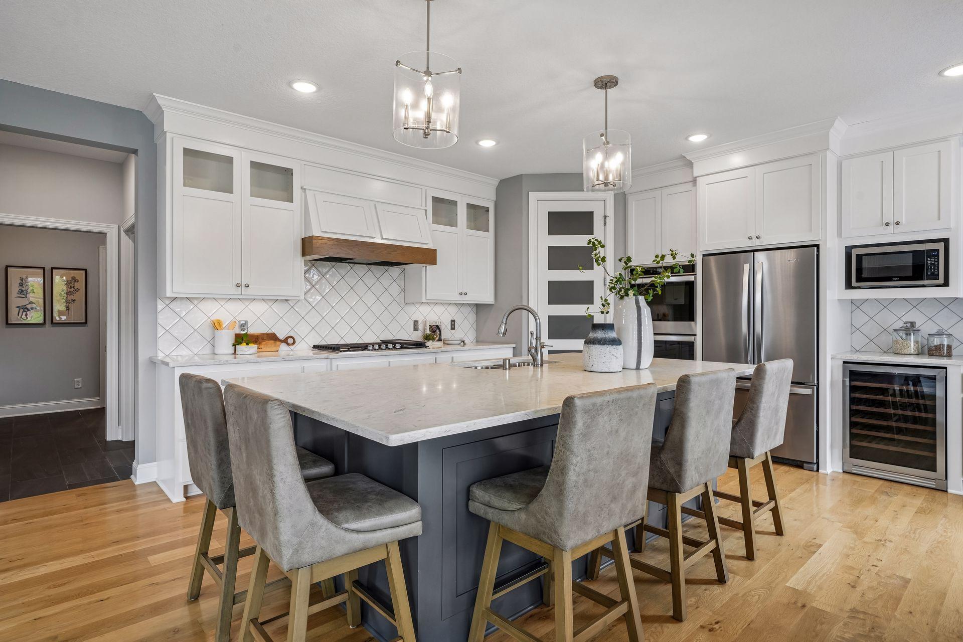 Stainless steel appliances and a built-in wine refrigerator!