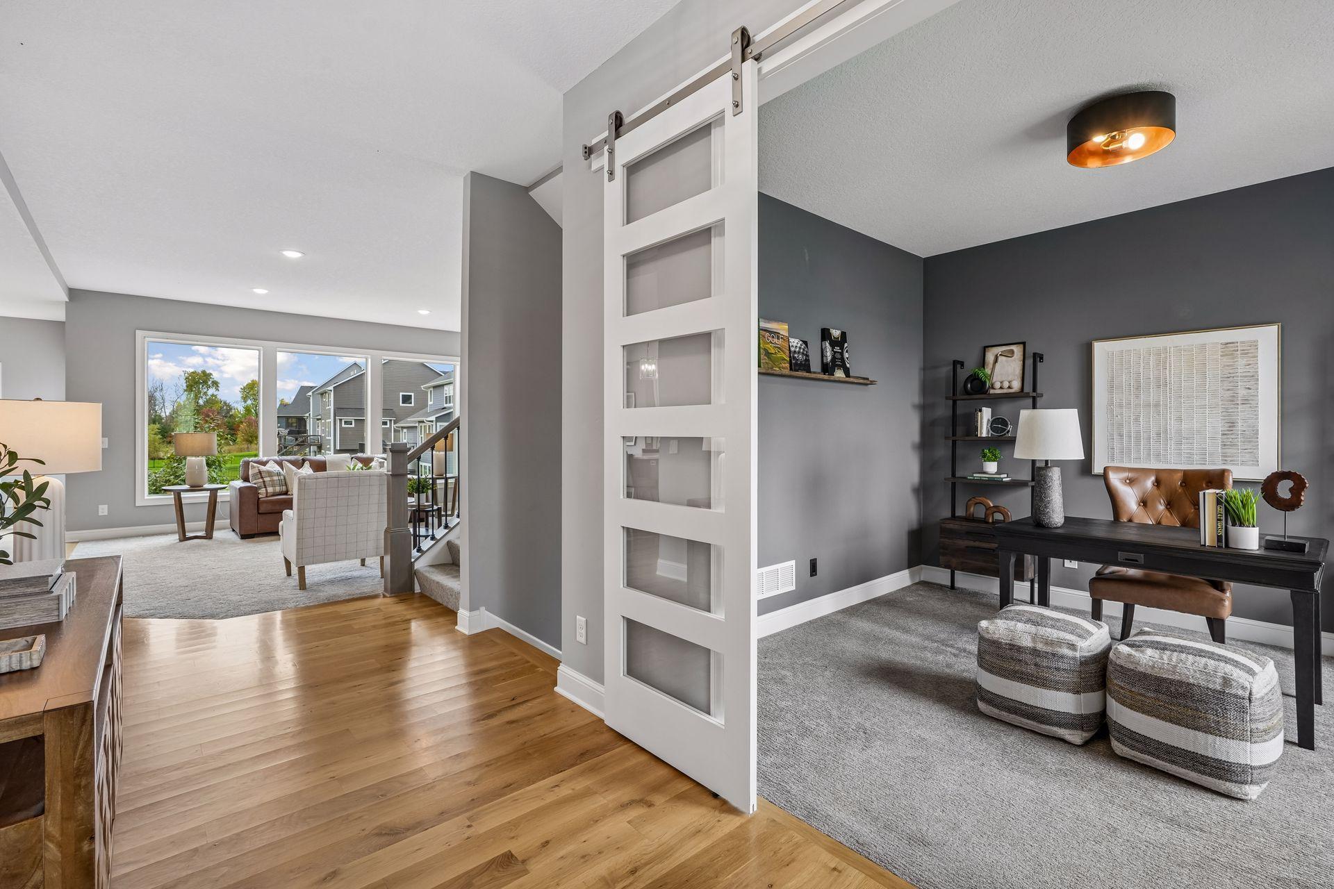 Decorative sliding doors add character and a stylish touch to the main-level office.