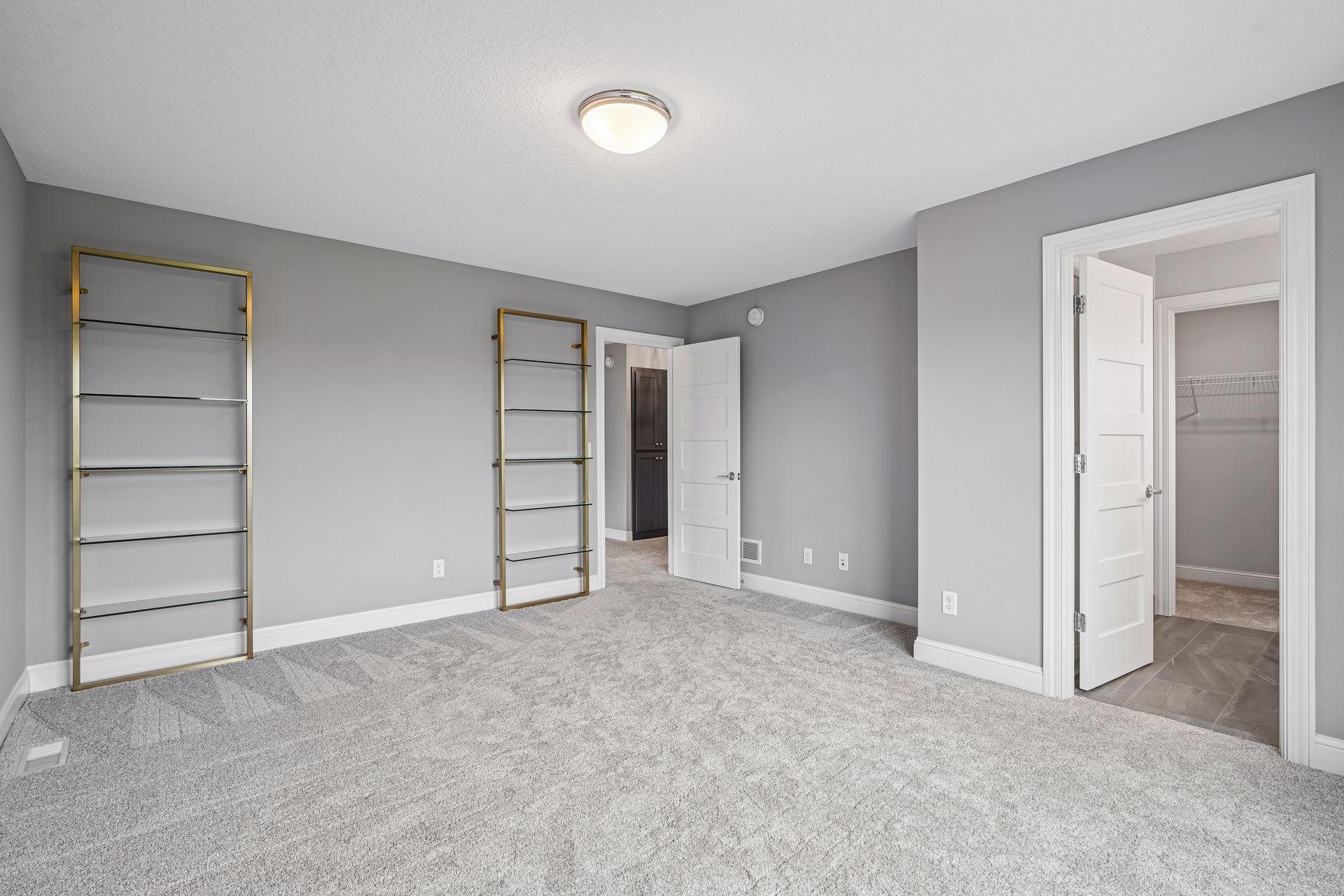 A junior suite with a private three-quarter bathroom and walk-in closet offers added comfort and privacy.
