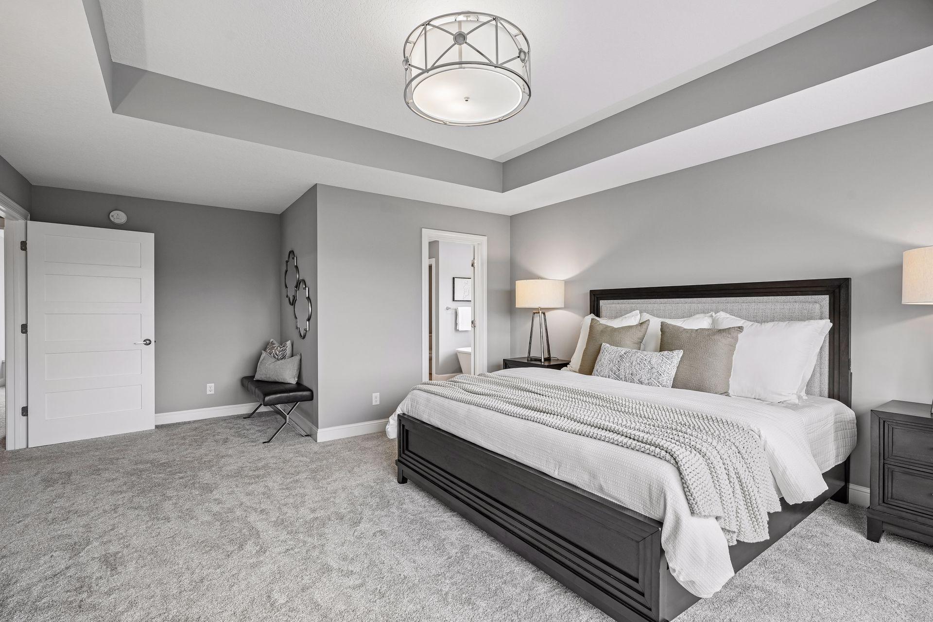A peaceful primary bedroom offering a private escape at the end of the day.