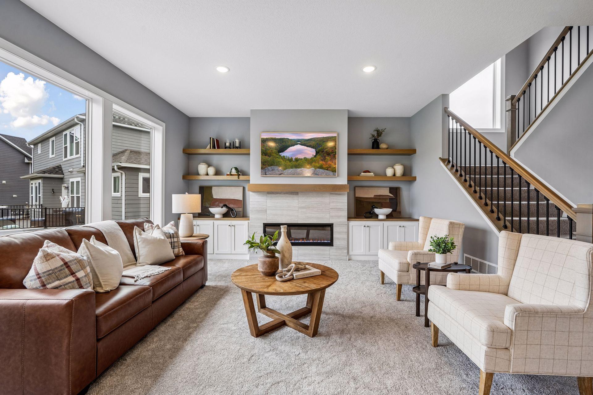 Custom built-in cabinetry and shelving provide a polished look with practical storage.