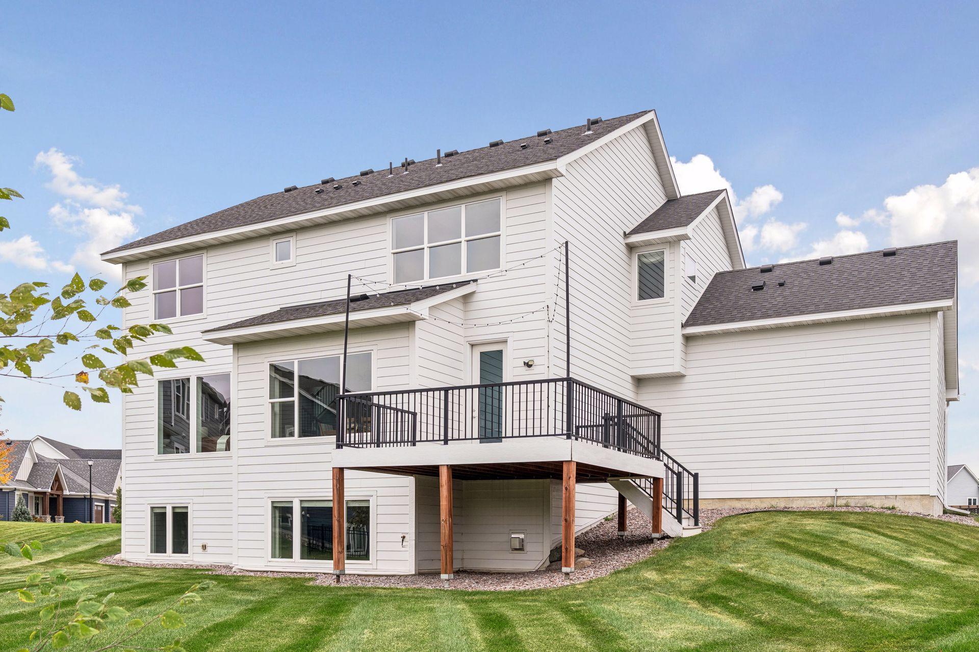 Enjoy the backyard setting and maintenance-free deck, perfect for outdoor dining, entertaining, or relaxing.