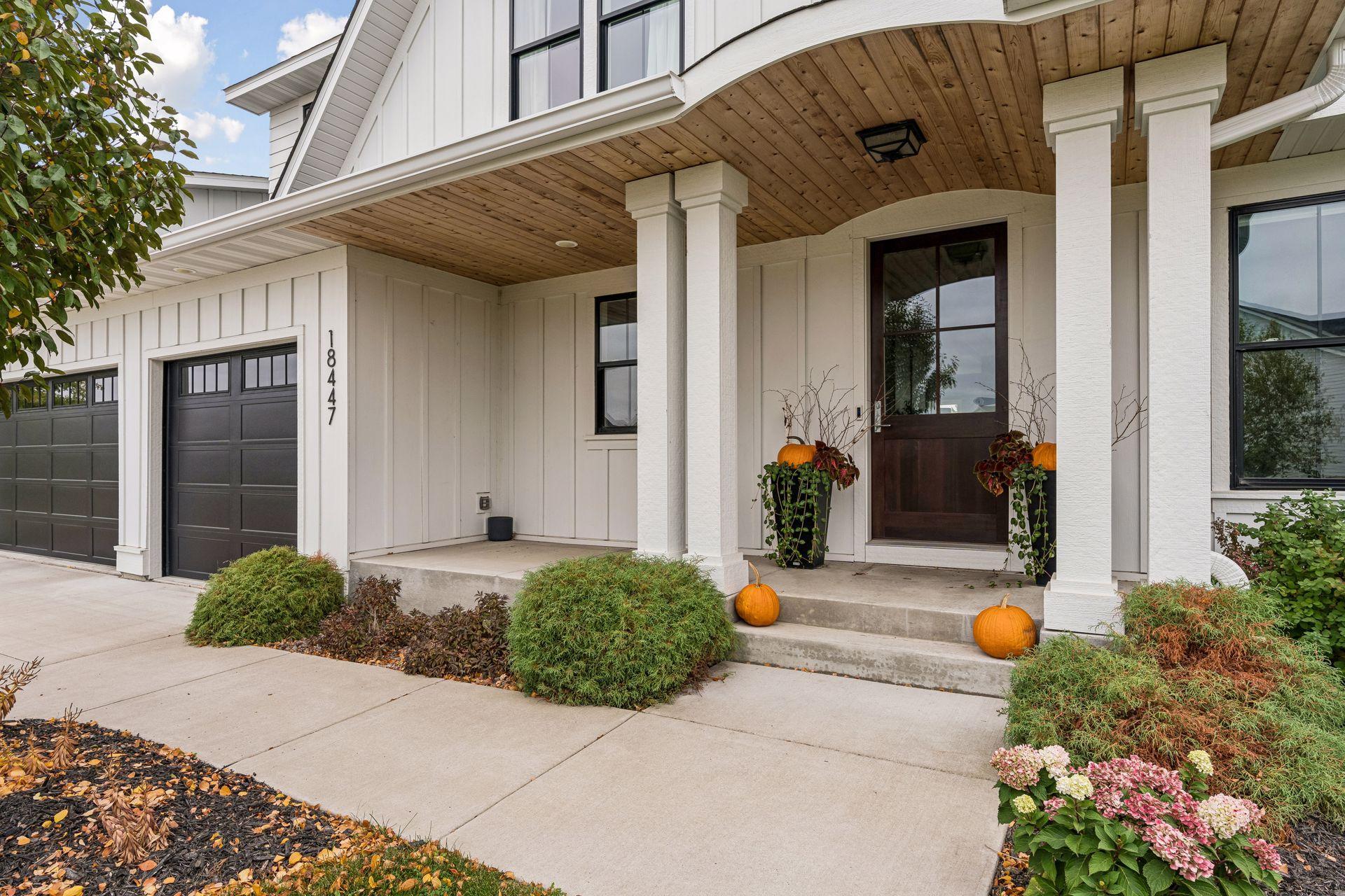 A gorgeous front porch offering a warm welcome and the perfect place to unwind.