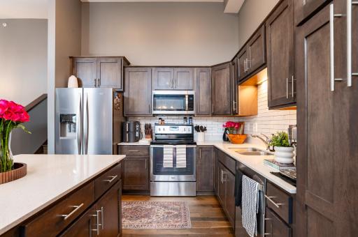 Engineered wood floors through the main and upper levels.jpg