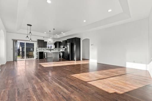 Upper Living Room (newer laminate flooring; tray ceiling; recessed lighting)