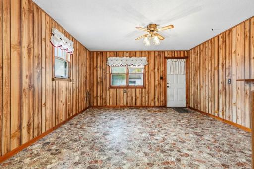 Rear entry brings you in to a space that could be utilized as a formal dining room or a family room