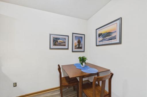 Dining Area: Cozy dining area offering a comfortable space for everyday meals, conveniently located just off the kitchen and living room.