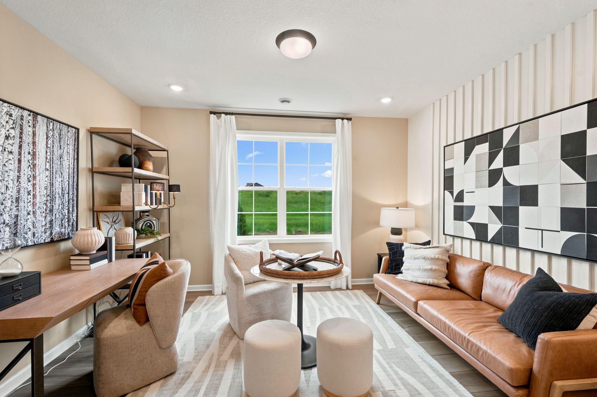 Multi-purpose flex room for work and play. *Photo of model home- design and structural options may vary.