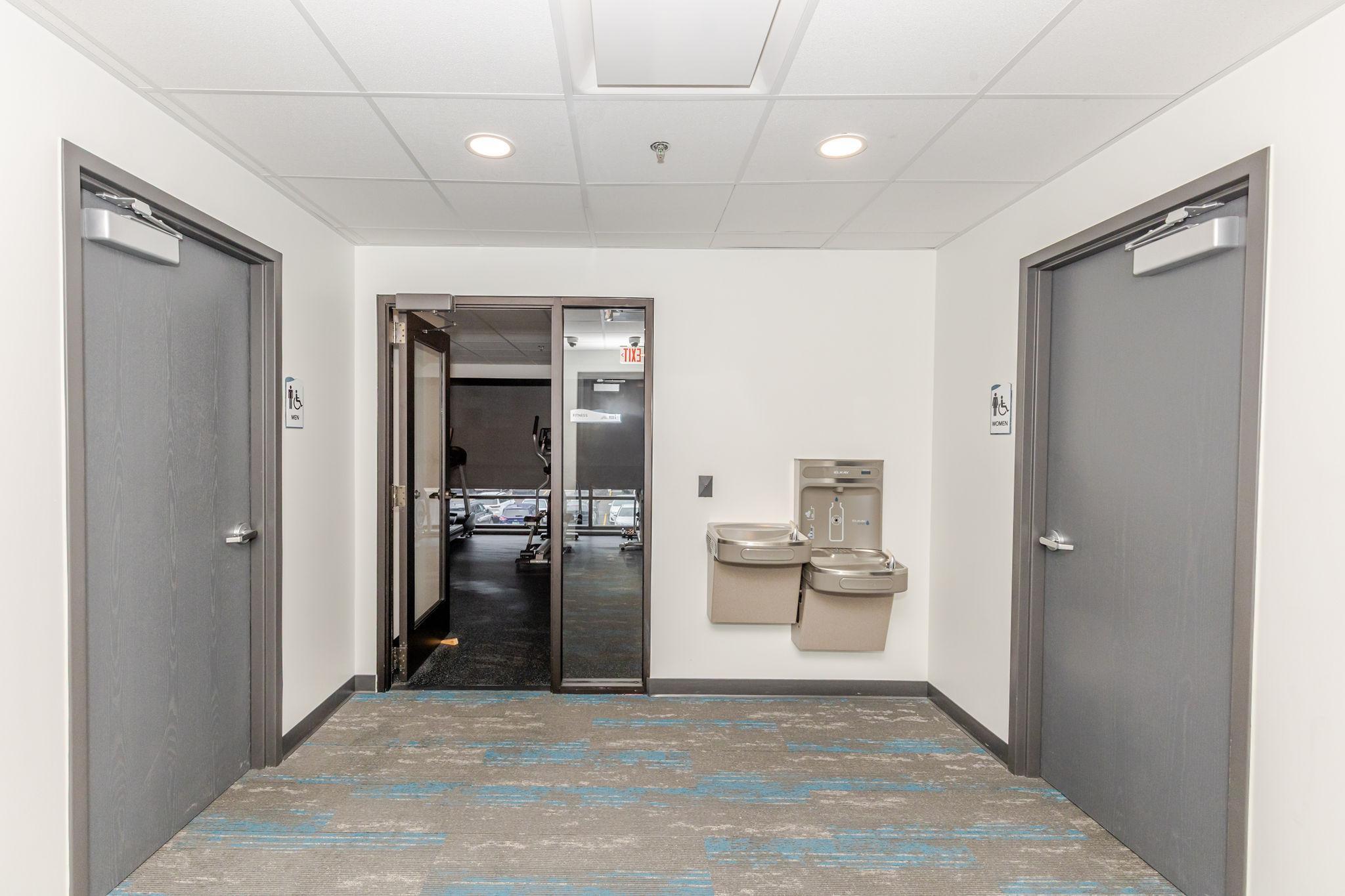 Fitness Center Entrance w/ bathrooms