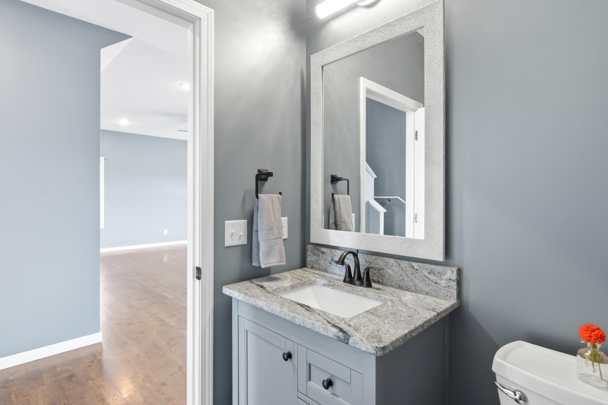 Half Bath at Entry Foyer