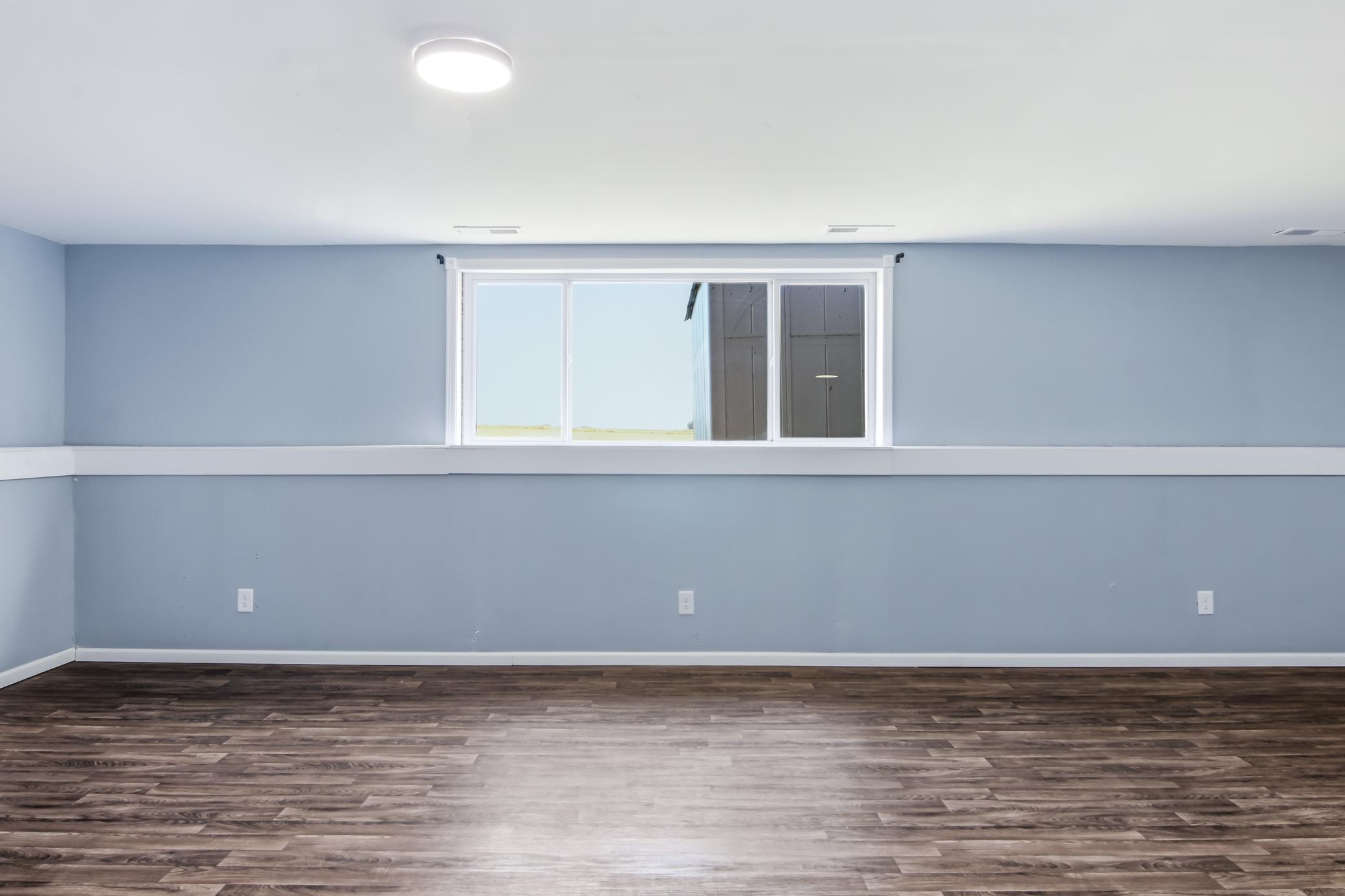 Lower Level Family Room with Lookout Windows