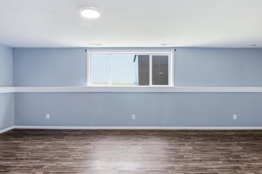 Lower Level Family Room with Lookout Windows