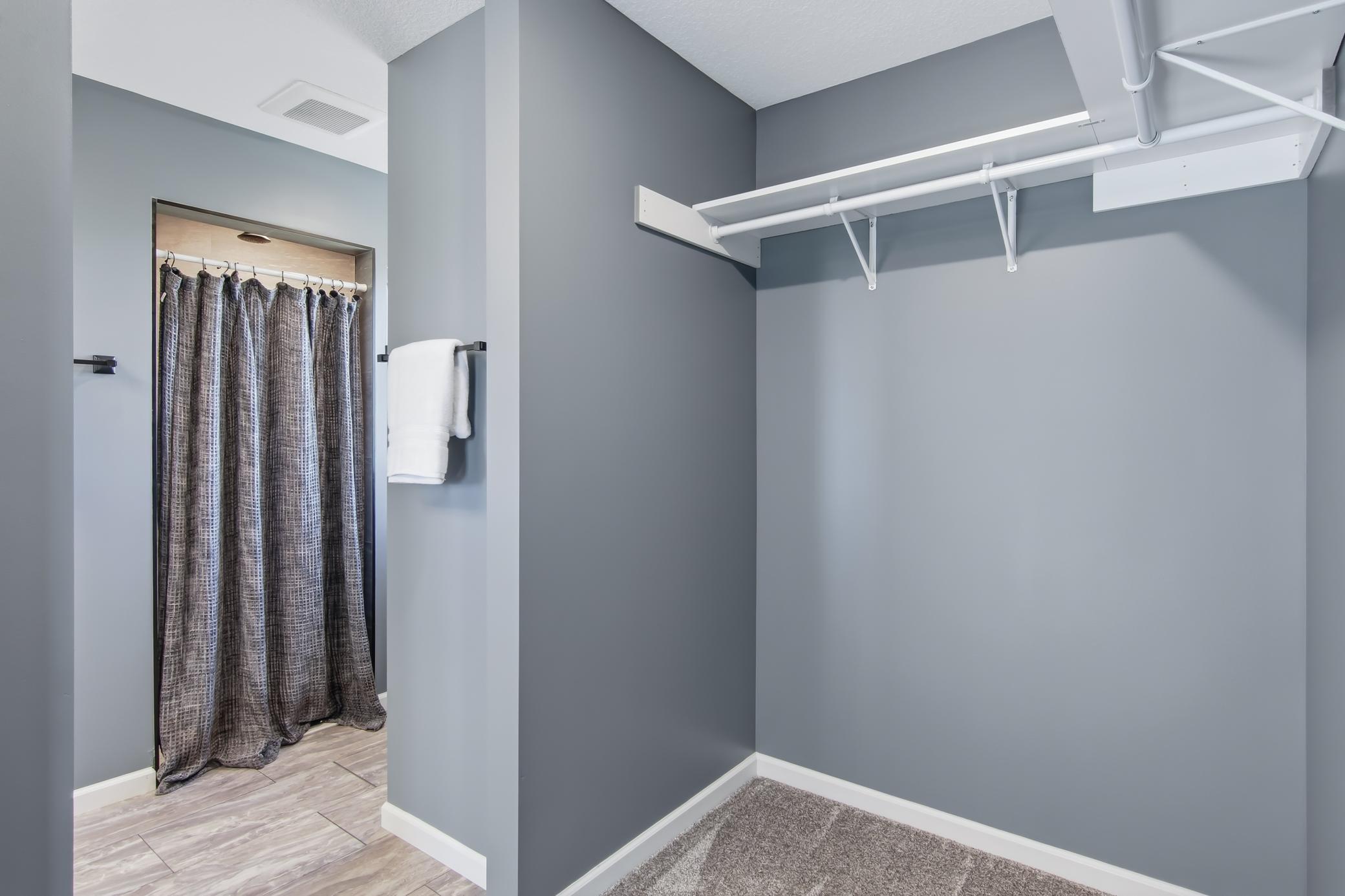 Walk-In Closet and Primary Bath with Shower
