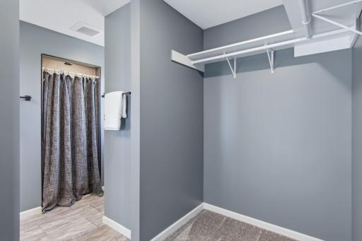 Walk-In Closet and Primary Bath with Shower