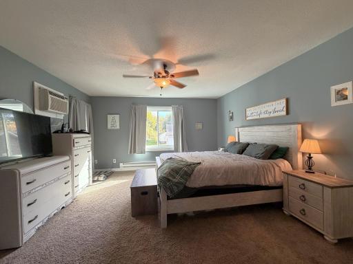 Primary Bedroom with Ensuite - Full bath and Walk in Closet.