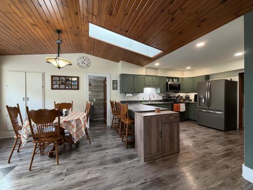 The Skylight brightens up the Informal Dining Room, 1/2 Bath and Kitchen.