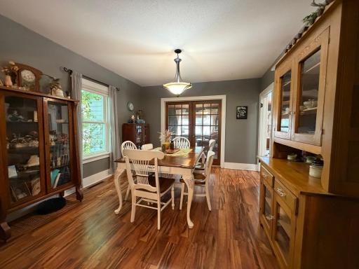 Dining Room with French Doors to the Family Room and Doorway to the Kitchen.