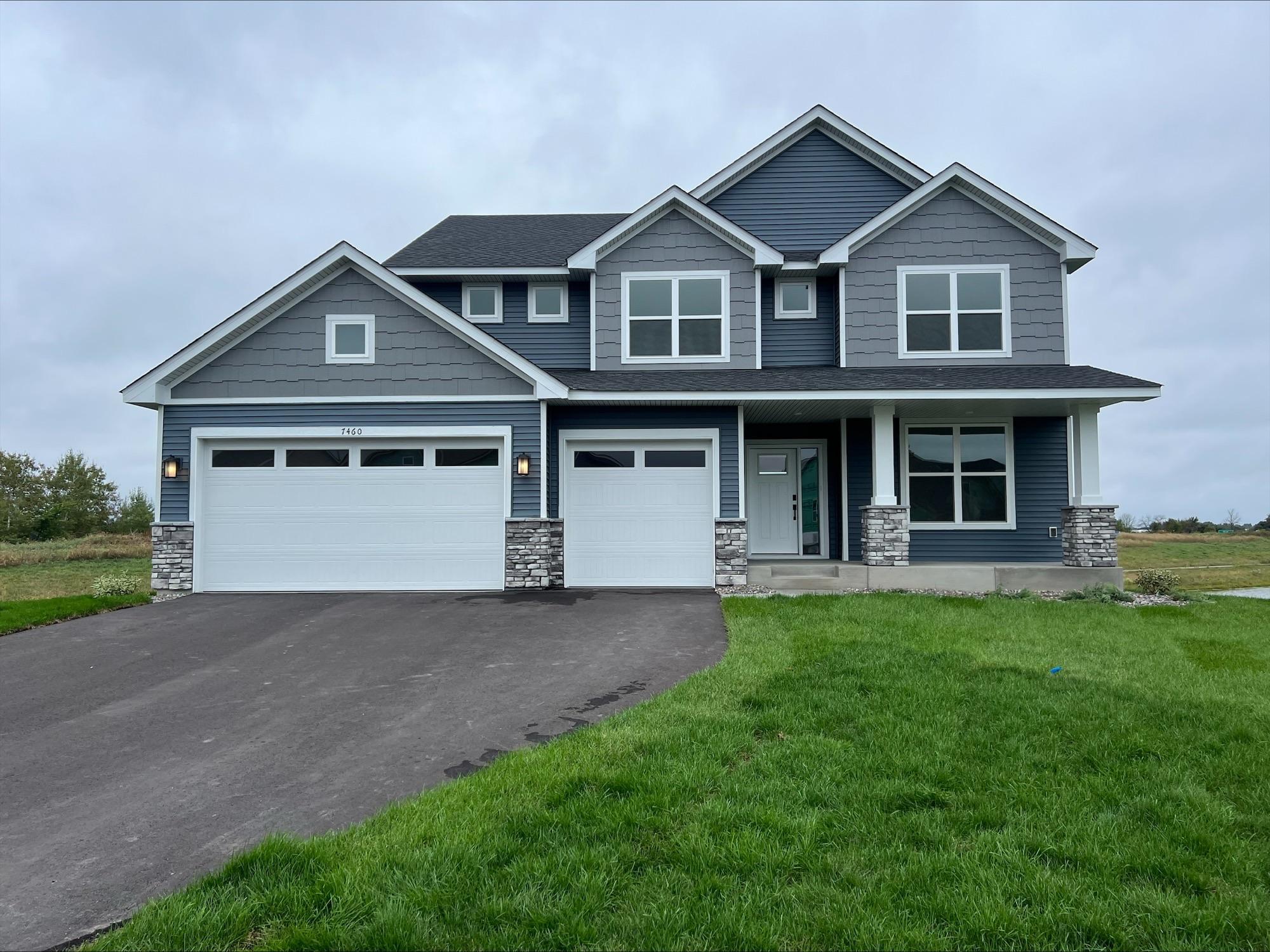 Welcome to 7460 Lotus Ln! (Photo is of the actual home.)