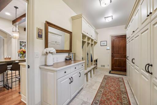 The mud room going toward the garage has built in closets and more to utilize and it is tucked away to hide if necessary