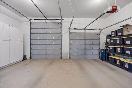 2 car garage with extra high door for a car lift to utilize more space
