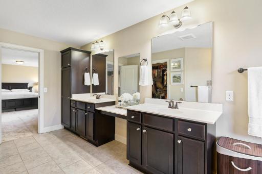 The thoughtful layout offers plenty of room for everyday routines while connecting conveniently to the primary bedroom and walk-in closet.