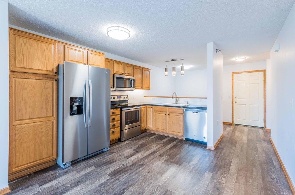 Stainless steel appliances in this beautiful condo.