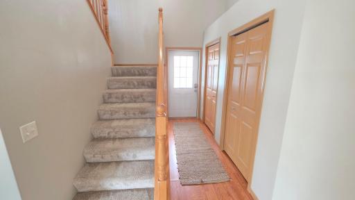 Open foyer entry with double closets! No need to store the winter clothes somewhere else.