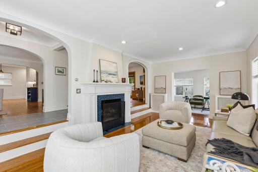 Living room centered on a wood-burning fireplace